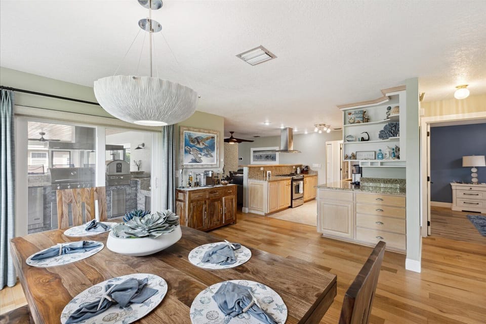 A charming dining space that connects to the kitchen and lanai for effortless entertaining.