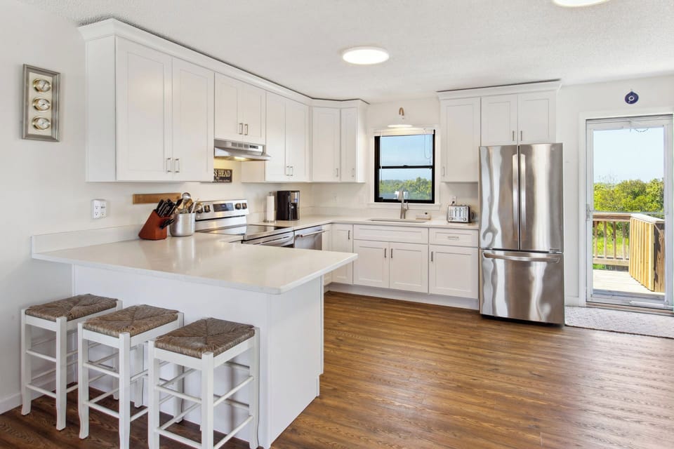 The Kitchen with modern appliances is perfect for whipping up something delicious that the whole family will love.