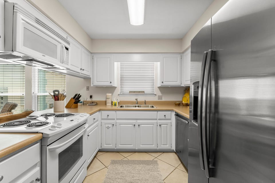 The kitchen is fully equipped with everything needed to prepare a delicious family meal.