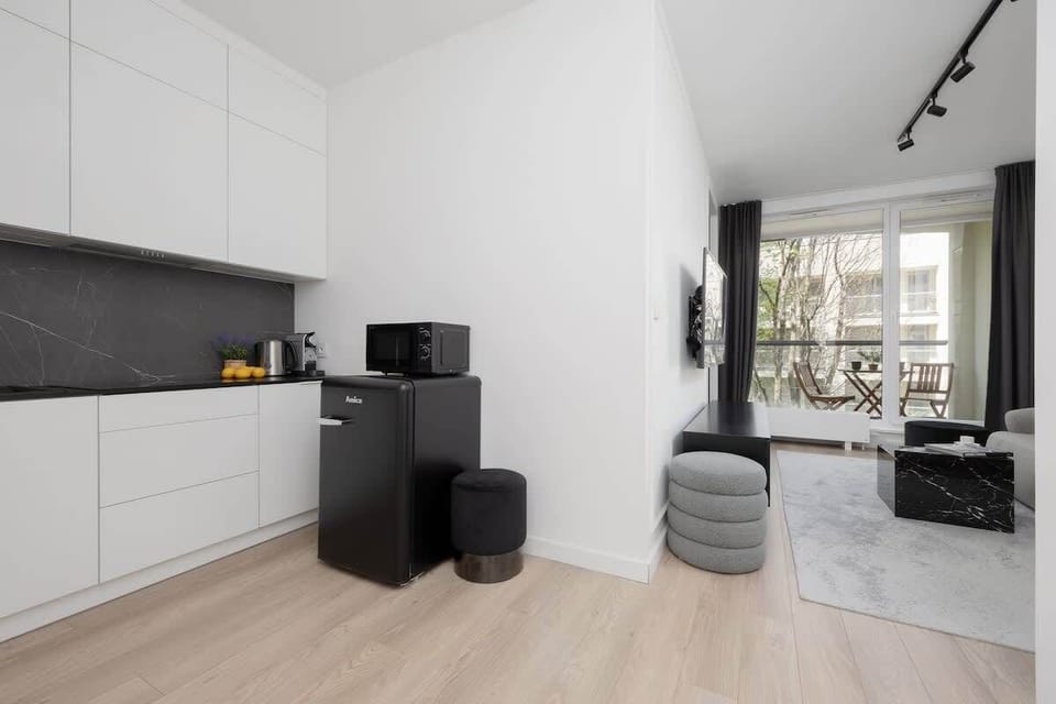The kitchenette's practical layout maximizes space and functionality.