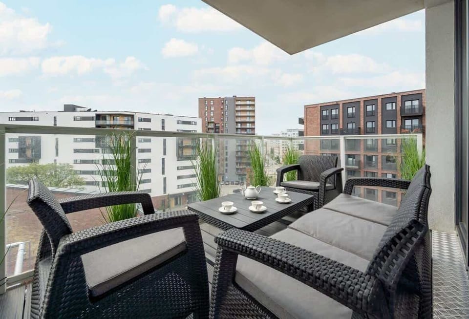 Balcony with table and chairs