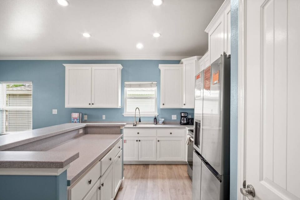 Spacious kitchen island, perfect for cooking or gathering.