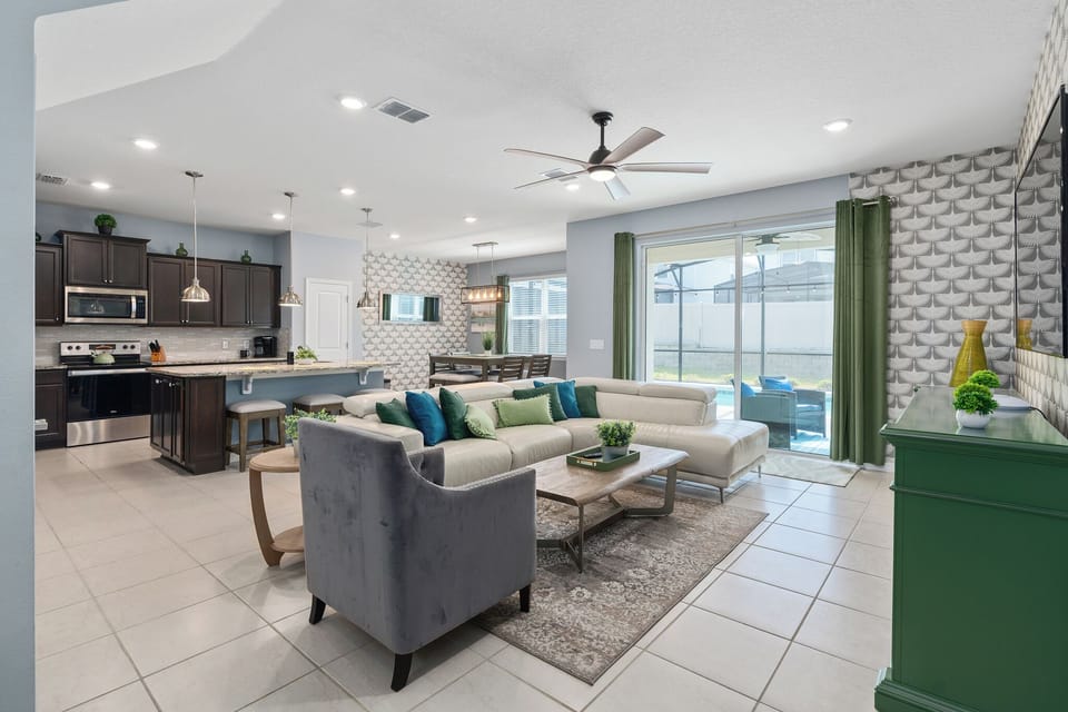 Open floor plan with backyard pool