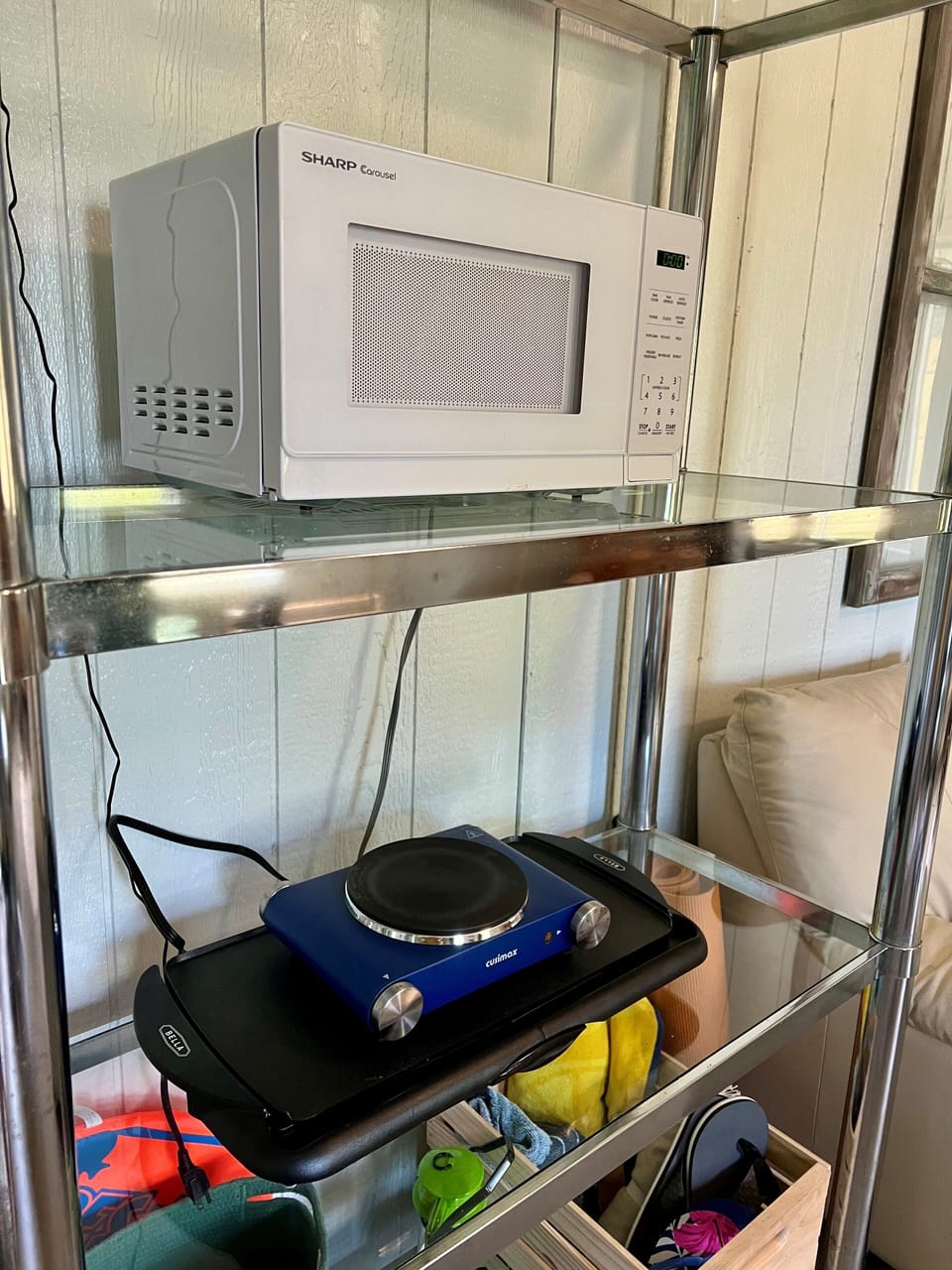 Microwave, hot plate, griddle and gas grill with side burner. No oven/stove