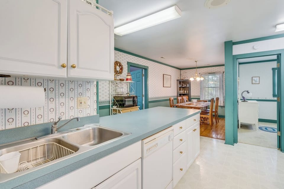 Kitchen leads to large Dining Area.