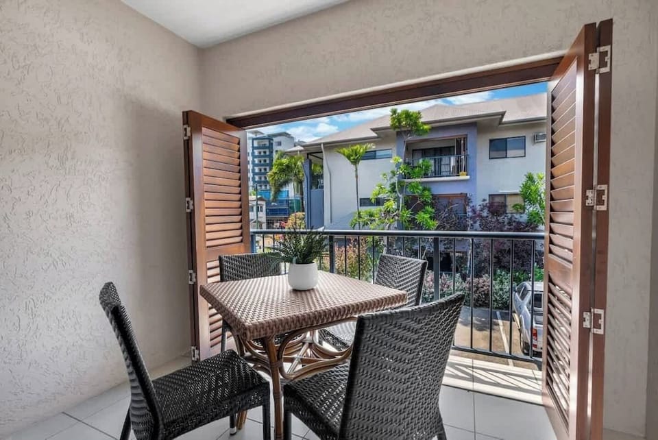 Furnished with a four-seater table, the balcony is ideal for alfresco meals and soaking up the tropical atmosphere.