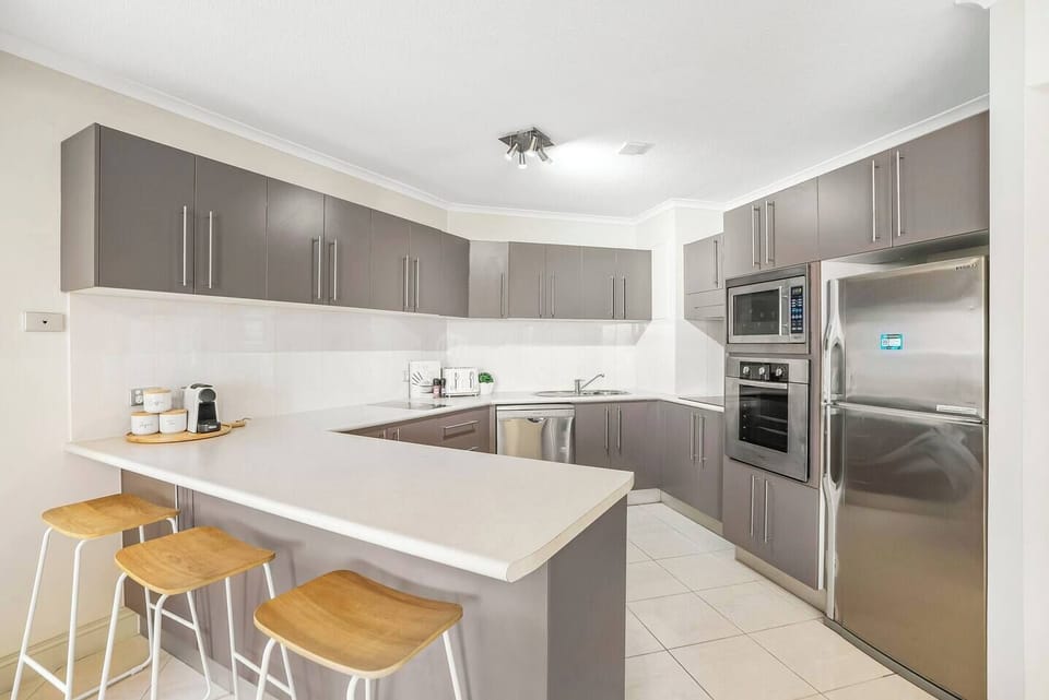 The fully equipped kitchen provides everything you need for culinary creativity, boasting modern appliances and ample counter space to make meal preparation a breeze.

