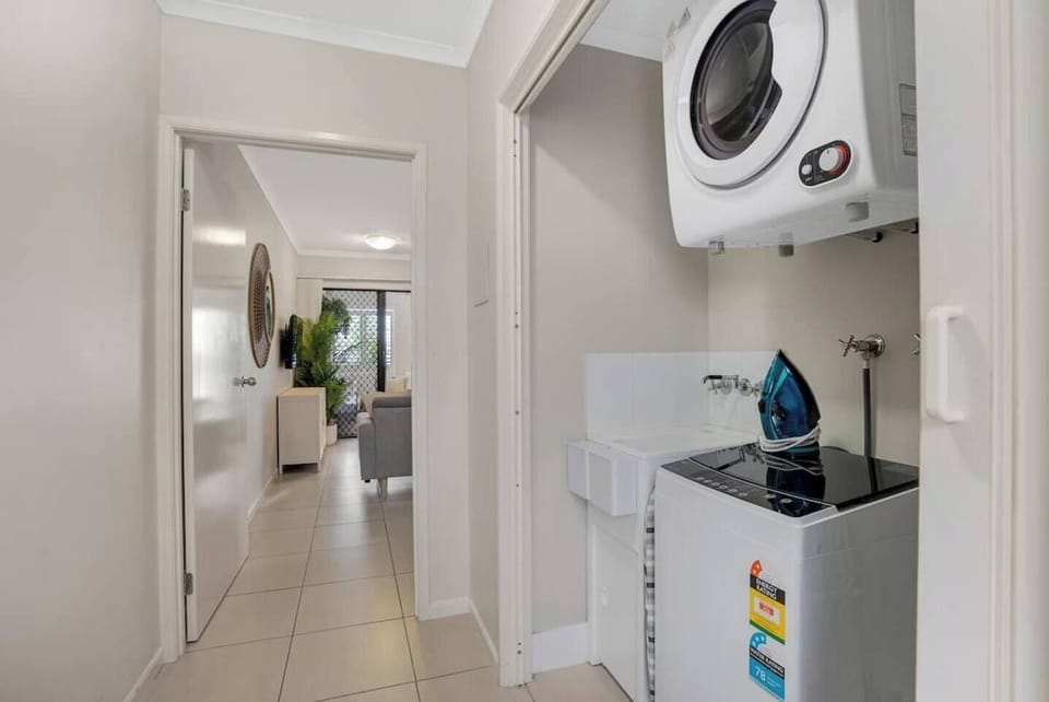 Convenient in-unit laundry facilities make it easy to keep up with your washing during your stay, adding to the comfort and convenience of this family-friendly apartment.