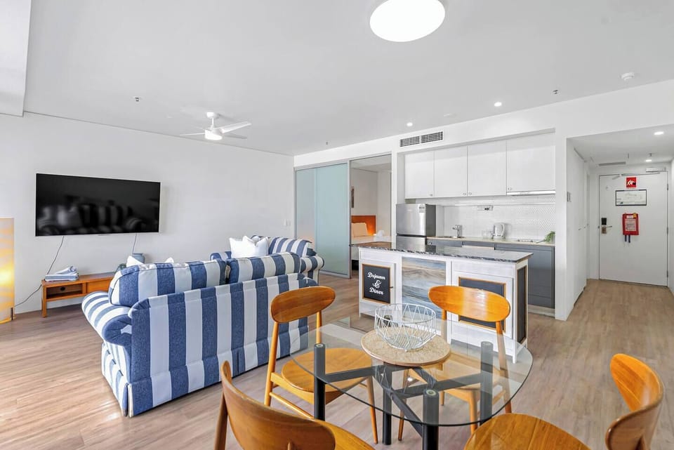 The spacious dining area offers seating for everyone and seamlessly blends with the open-plan living and kitchen space.
