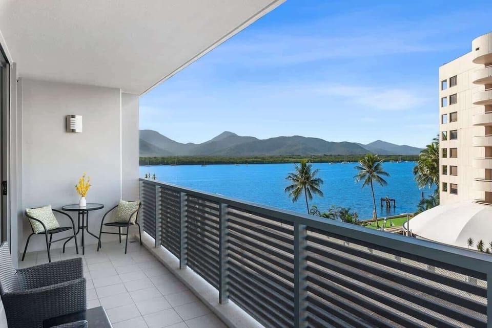 Step out onto your private balcony, where seatings provide a romantic spot to unwind while taking in the stunning views of the Cairns inlet and city skyline.