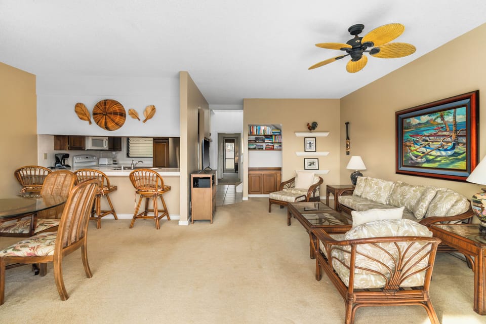 Relax in your open-concept tropical retreat with island-inspired furnishings, a fully equipped kitchen, and coastal artwork that brings Hawaii's charm indoors.