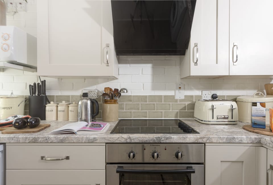 Roseland Cottage, Ground Floor: With an electric oven and hob, fridge, microwave and washing machine