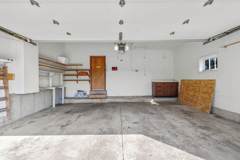 Two-car garage with direct home access for added convenience.