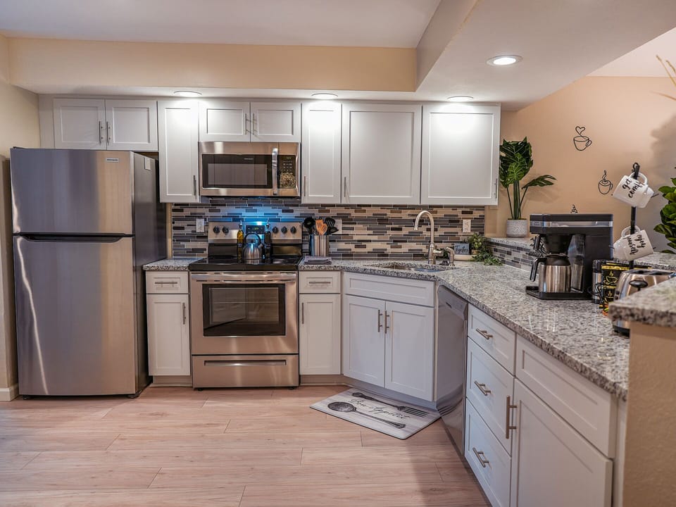 Well-stocked kitchen with standard appliances. Fridge/freezer with icemaker. Full-size Bunn coffee maker and grinder. Crockpot, blender, mixer, pots/pans/sheets, etc. for prepping almost any meal.