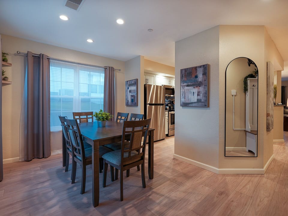 Dining room with padded chairs for 6.
