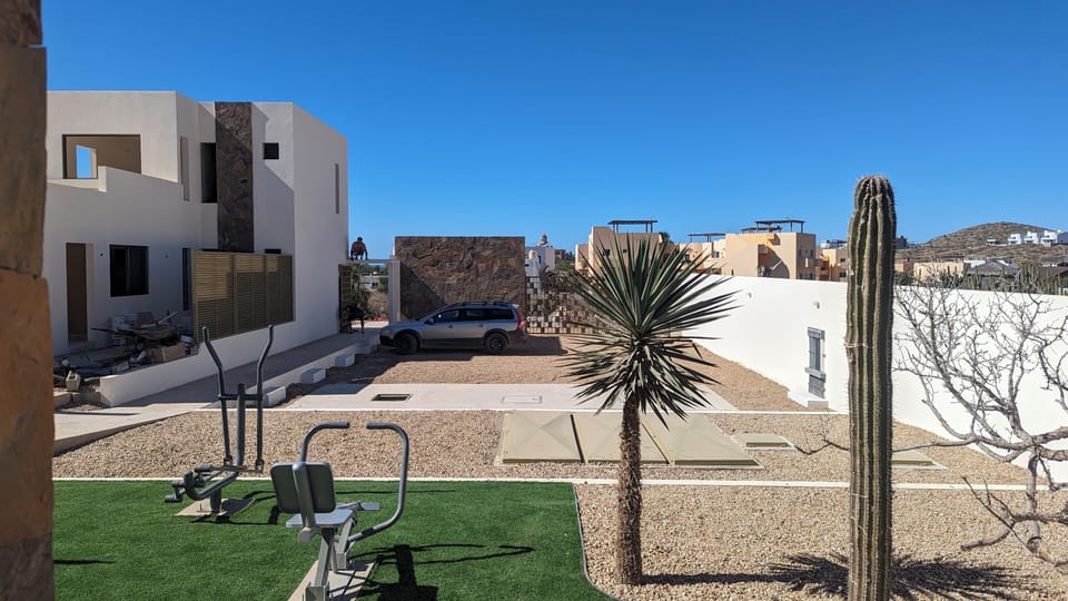 View of parking and fitness area from Casa Arena