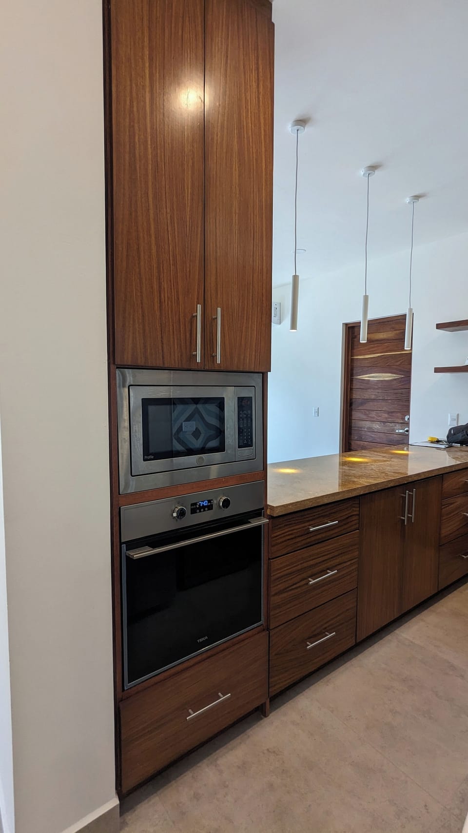 Kitchen microwave and wall oven