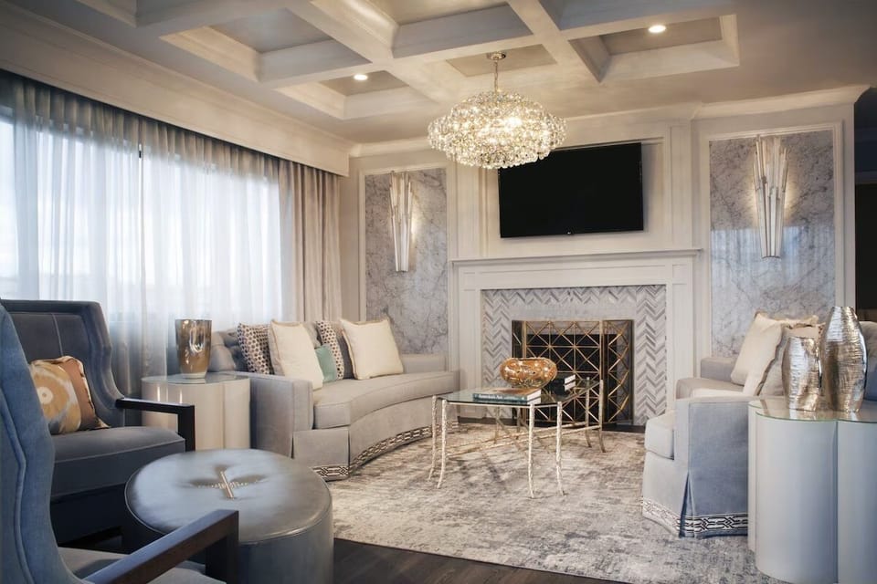 Gather under the sparkling chandelier for cozy evenings in style.