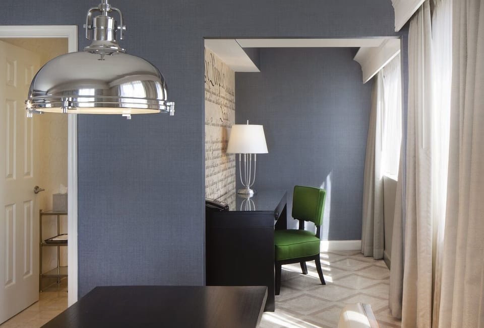 Work by the window with natural light and a quiet nook.