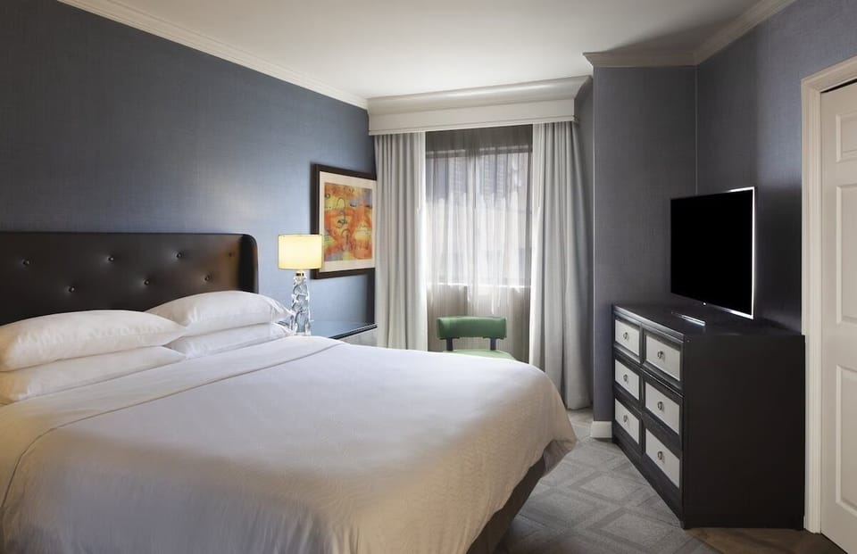 Wake up refreshed with spacious comfort and easy in-room entertainment.