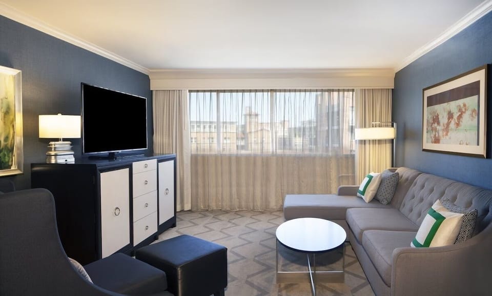 Stretch out together in the airy lounge with big-screen TV.