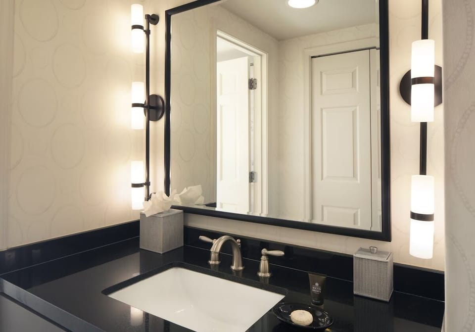 Refresh at the spotless vanity with flattering, spa-like lighting.