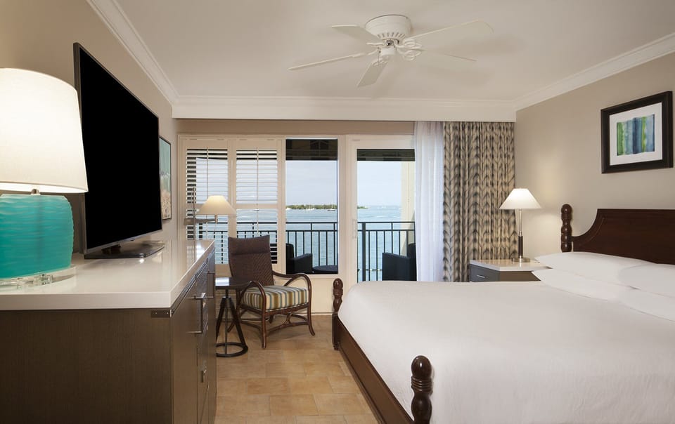 Wake up to sea breezes and balcony views from bed.