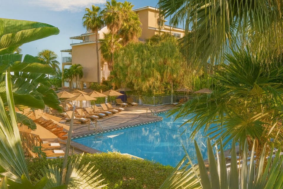 Stretch out poolside and enjoy calm, tropical surroundings.