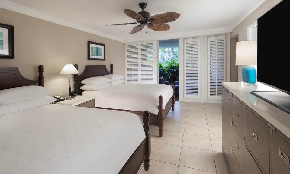 Settle in with bright shutters, ceiling fan, and roomy layout.