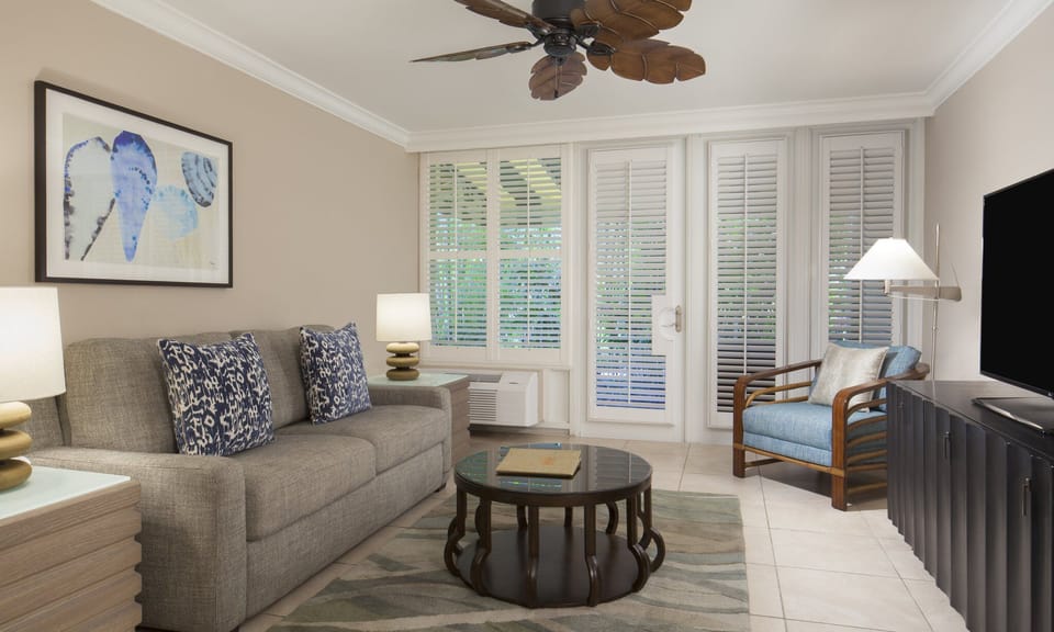 Gather for cocktails and conversation in a stylish coastal lounge.