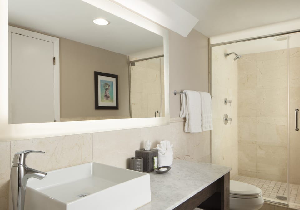 Refresh in a sleek spa-style bath with walk-in shower.