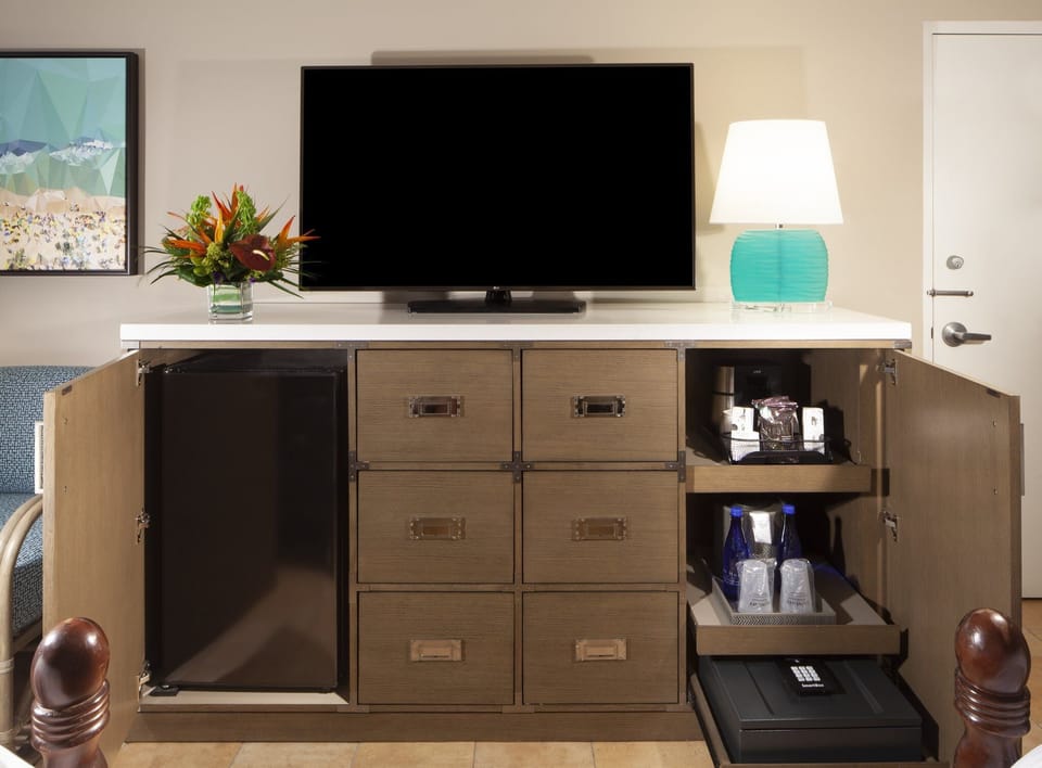 Settle in with entertainment, chilled drinks, and convenient storage.