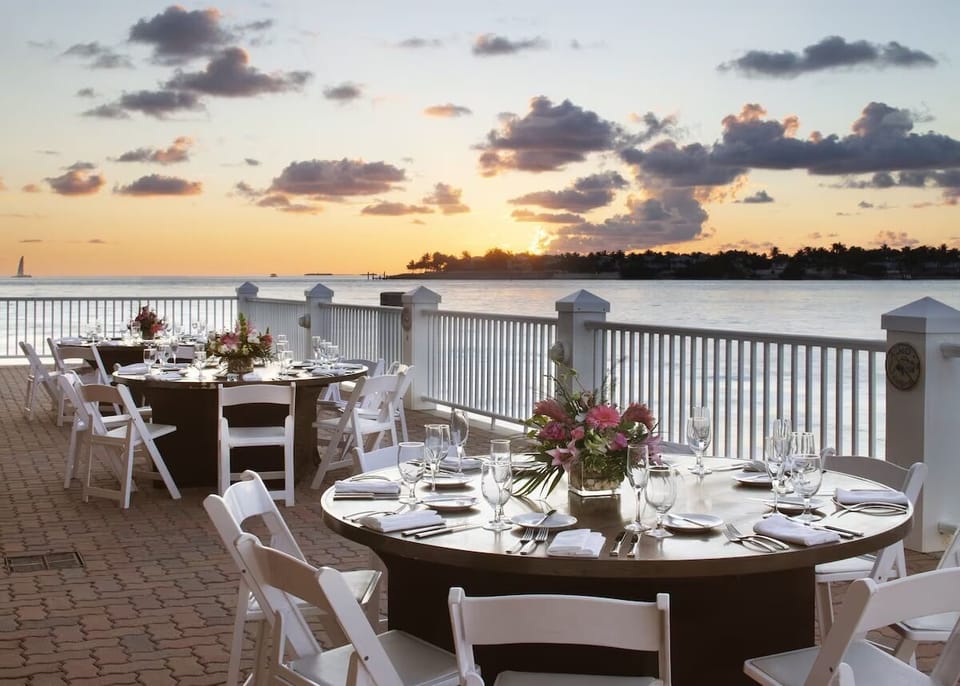 Savor sunset dinners waterfront as the sky turns gold.
