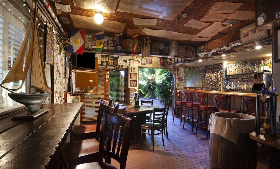 Settle in with friends where indoor-outdoor energy flows naturally.