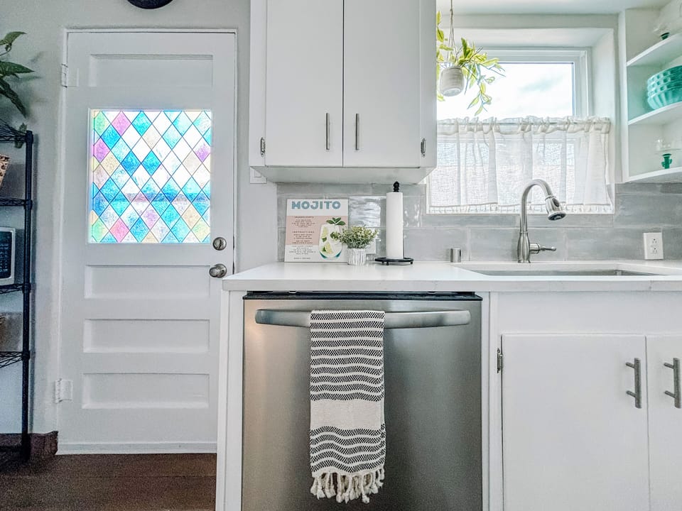 The door off the kitchen leads to the beautiful rear patio.