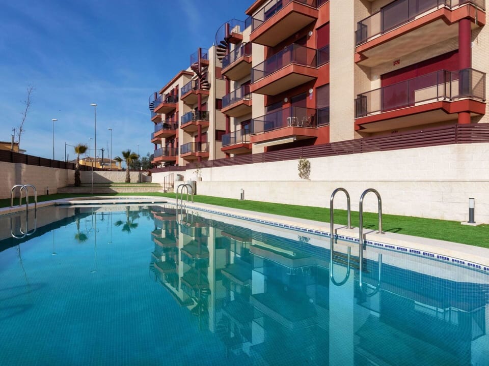 Water, Building, Sky, Property, Window, Azure, Swimming Pool, Urban Design, Condominium, Leisure