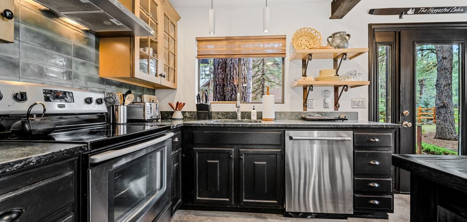 Fully equipped kitchen with stainless steel appliances and everything you need to cook at home.