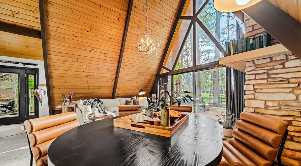 Share meals and memories around the stylish dining table under warm wood accents.