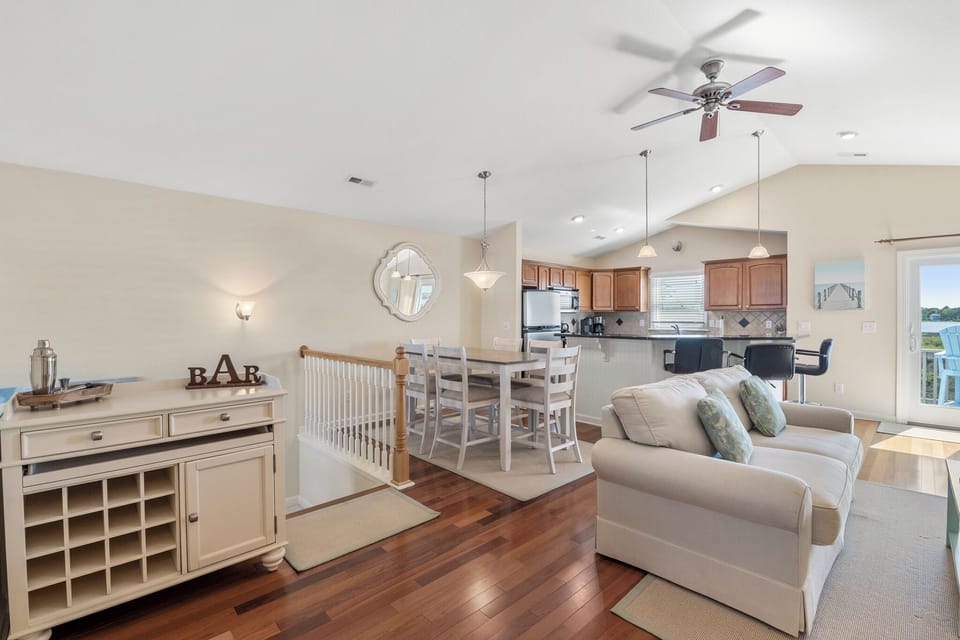 CLP112D: Bay Dream Believer | Top Level Living and Dining Area