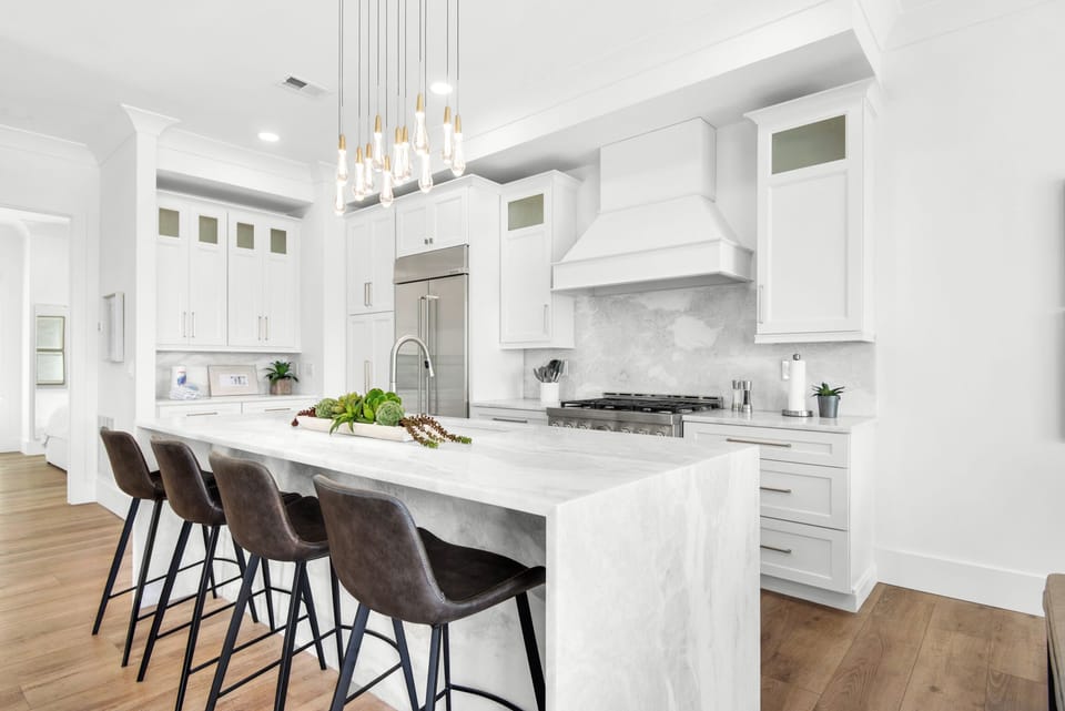 Marble waterfall kitchen island