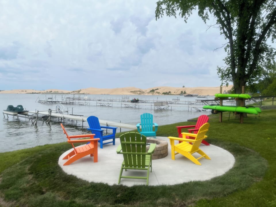 Lakeside firepit and patio.  Relax while the kids swim! Shallow, sandy bottom.