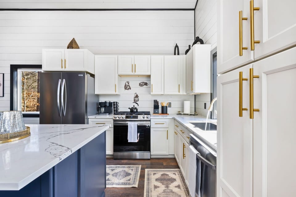 Prepare your favorite meals in our fully equipped kitchen, where elegance meets functionality for your culinary adventures.