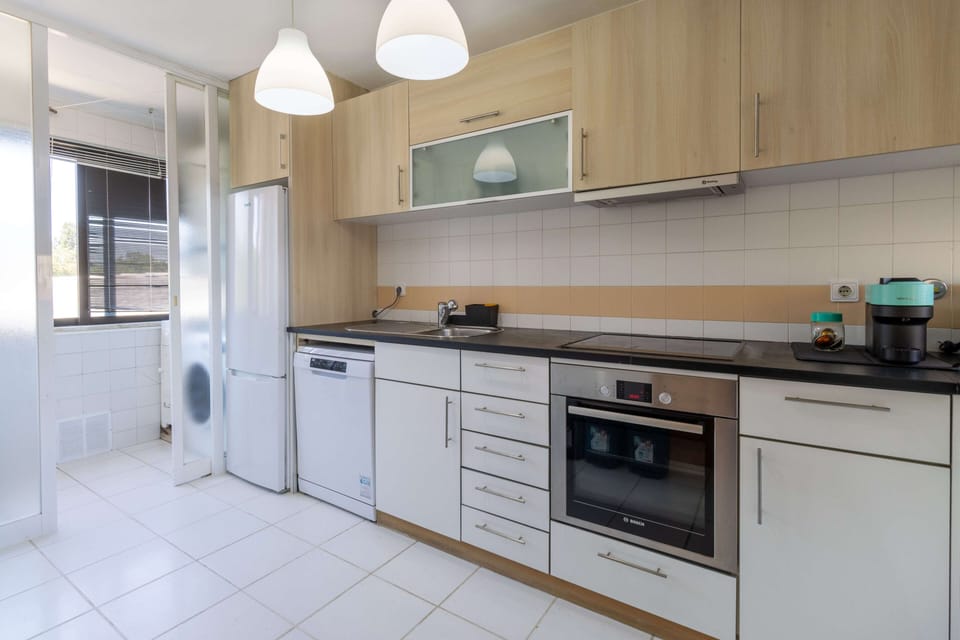 Fully equiped kitchen w/laundry room