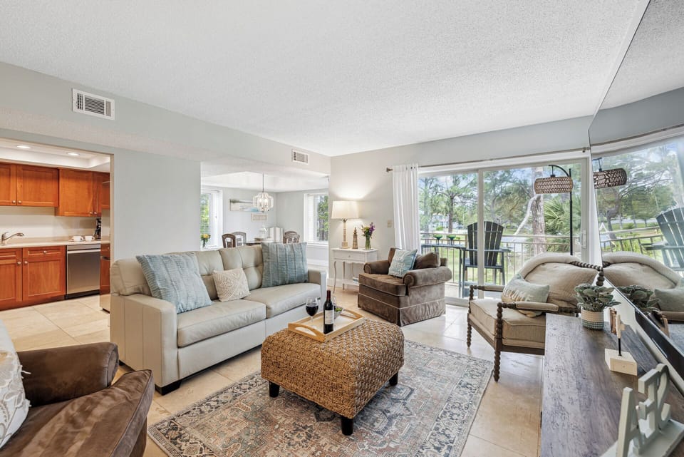 Upon entry, guests are welcomed into a tastefully decorated living area.