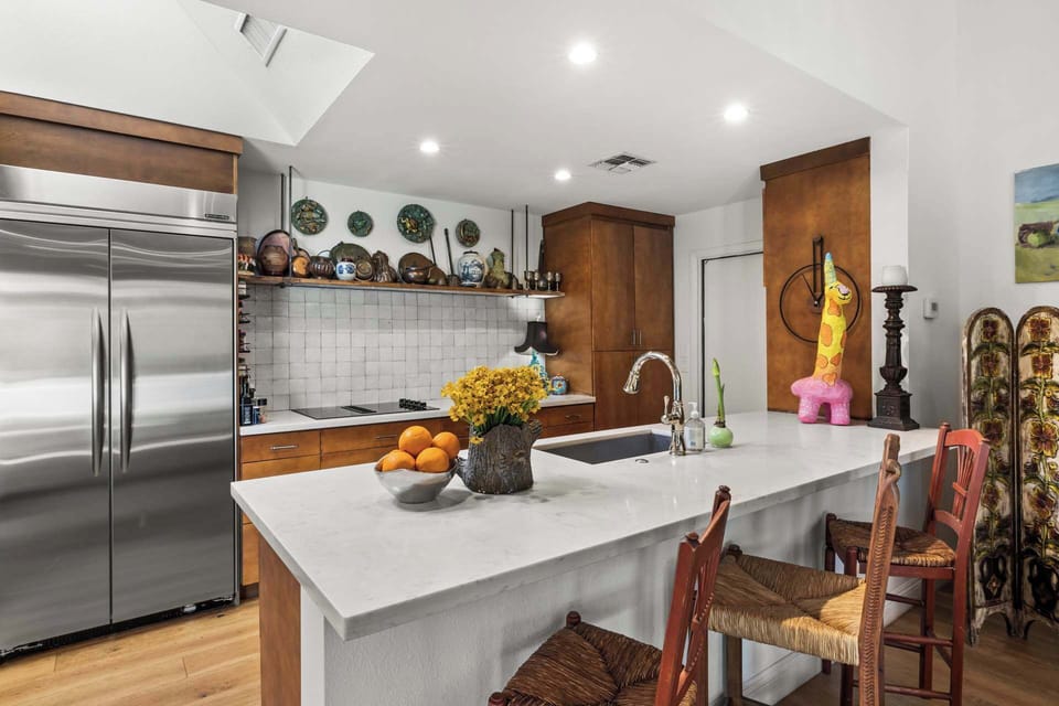 Beautiful marble countertops for preparing meals.