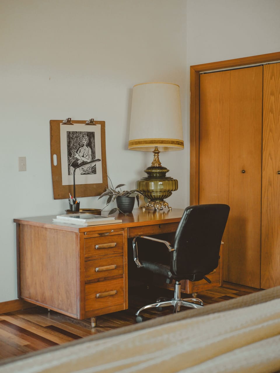 Vintage workspace with a timeless desk and elegant decor.