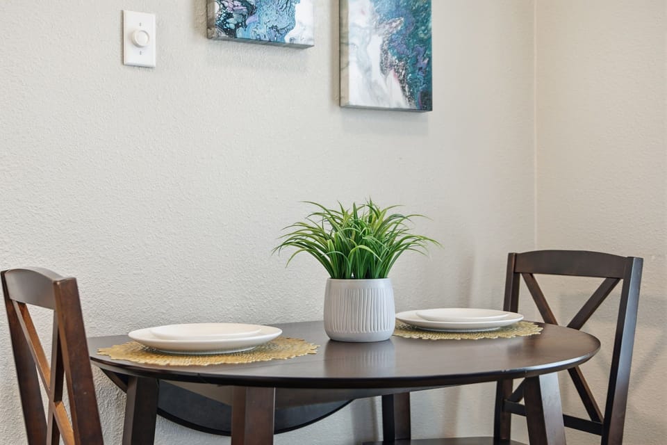 Intimate dining setup for two, great for breakfast or a casual evening meal.