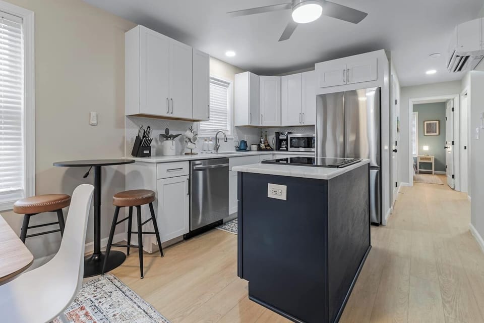 Modern meets functionality in our kitchen space, designed for both style and convenience.