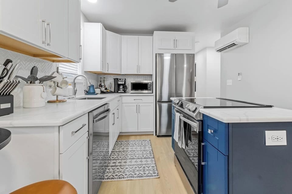 Cook up culinary delights in our fully stocked kitchen - stainless steel appliances and cooking basics included!