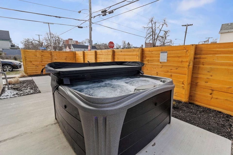 Relaxation awaits in our inviting 4 person hot tub - the perfect spot to unwind after a day around town.